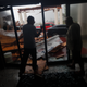 Hotel employees in Panama City Beach survey damage caused by the hurricane.